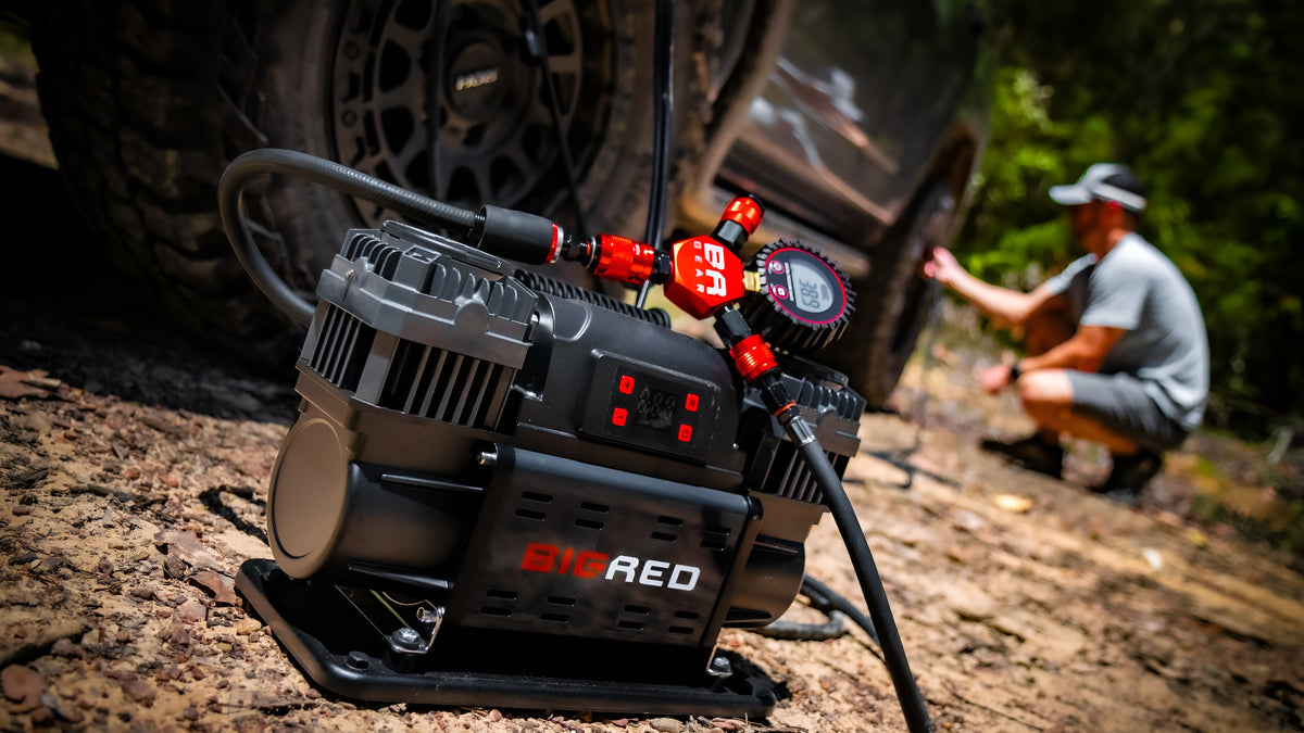 Big Red Gear twin head air compressor airing up at the tyre